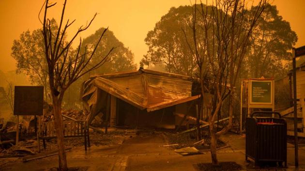 The remains of burnt out buildings are seen along the main street in the New South Wales town of Cobargo. AFP reports that the crisis has focused attention on climate change—which scientists say is creating a longer and more intense bushfire season—and sparked street protests calling for immediate action to tackle global warming. (Sean Davey/AFP) The remains of burnt out buildings are seen along the main street in the New South Wales town of Cobargo. AFP reports that the crisis has focused attention on climate change—which scientists say is creating a longer and more intense bushfire season—and sparked street protests calling for immediate action to tackle global warming. (Sean Davey/AFP)