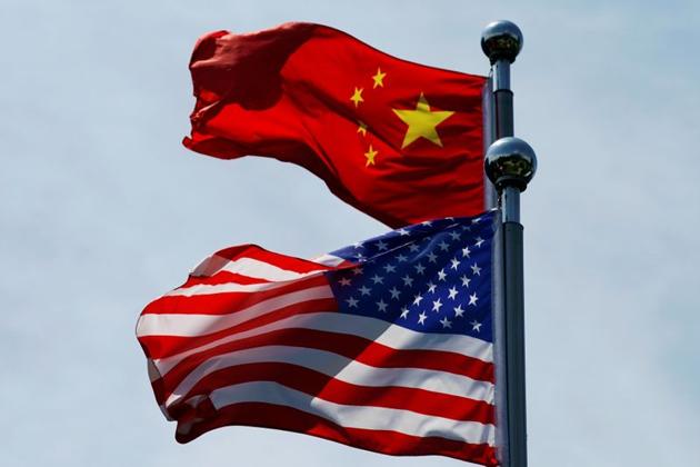 Chinese and US flags flutter near The Bund, before U.S. trade delegation meet their Chinese counterparts for talks in Shanghai. (Photo: Reuters) Chinese and US flags flutter near The Bund, before U.S. trade delegation meet their Chinese counterparts for talks in Shanghai. (Photo: Reuters)