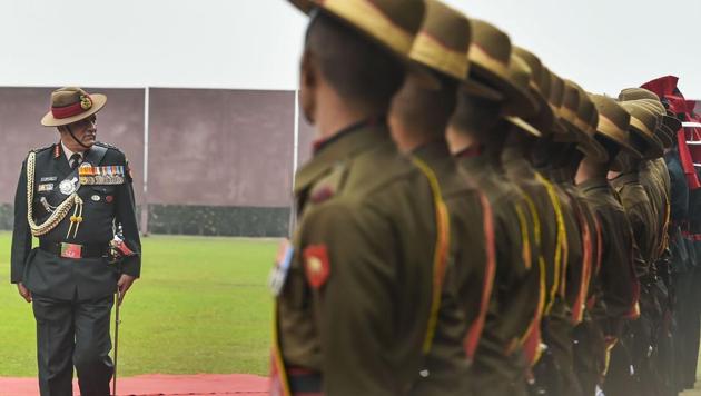 India's first Chief of Defence Staff(CDS) Gen Bipin Rawat inspects the Guard of Honour at South Block lawns in New Delhi, on 31 December.(PTI Photo)