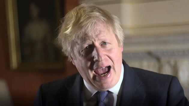 In this screen grab image issued by the Prime Minister's Press Office, showing Prime Minister Boris Johnson during his New Year's message to be broadcast. (AP) In this screen grab image issued by the Prime Minister's Press Office, showing Prime Minister Boris Johnson during his New Year's message to be broadcast. (AP)