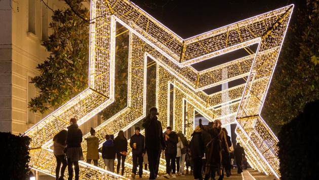 People walk under New Year and Christmas decorations during New Year celebrations in Podgorica, Montenegro. (Stevo Vasiljevic / REUTERS) People walk under New Year and Christmas decorations during New Year celebrations in Podgorica, Montenegro. (Stevo Vasiljevic / REUTERS)