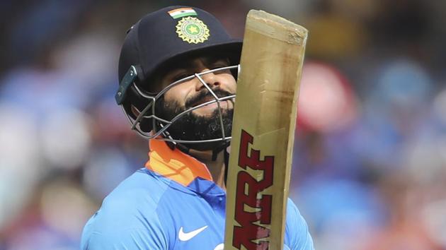 India's captain Virat Kohli reacts as he leaves the field.(AP)