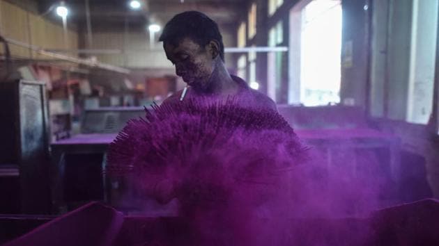 A worker covering incense sticks with coloured powder at the Fujian Xingquan Incense Factory in the city of Quanzhou in China's Fujian Province. Dozens of workers toil through the night coating thin lengths of bamboo in herbs, spices and richly coloured powders to create incense sticks that are spread out under the rising sun to dry. It is an important time of year for the villagers of Yongchun county, a mountainous area of south-eastern Fujian province that supplies much of the world’s incense. (Hector Retamal/AFP) A worker covering incense sticks with coloured powder at the Fujian Xingquan Incense Factory in the city of Quanzhou in China's Fujian Province. Dozens of workers toil through the night coating thin lengths of bamboo in herbs, spices and richly coloured powders to create incense sticks that are spread out under the rising sun to dry. It is an important time of year for the villagers of Yongchun county, a mountainous area of south-eastern Fujian province that supplies much of the world’s incense. (Hector Retamal/AFP)