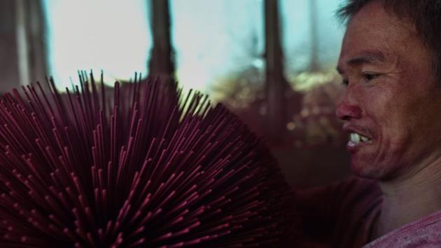 A worker covering incense sticks with coloured powder. Locals claim that one in every three incense sticks sold in South-east Asia is made in Yongchun. A round-the-clock production process involves up to 18 separate stages during which bamboo sticks are coated in fragrant herbs and spices and then dusted with powders of deep purple, red and yellow. (Hector Retamal/AFP) A worker covering incense sticks with coloured powder. Locals claim that one in every three incense sticks sold in South-east Asia is made in Yongchun. A round-the-clock production process involves up to 18 separate stages during which bamboo sticks are coated in fragrant herbs and spices and then dusted with powders of deep purple, red and yellow. (Hector Retamal/AFP)