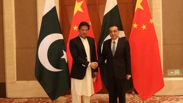 File photo: Pakistan Prime Minister Imran Khan (Left) meets Chinese Premier Li Keqiang at the Great Hall of the People in Beijing.(Courtesy: PM Office Pakistan)