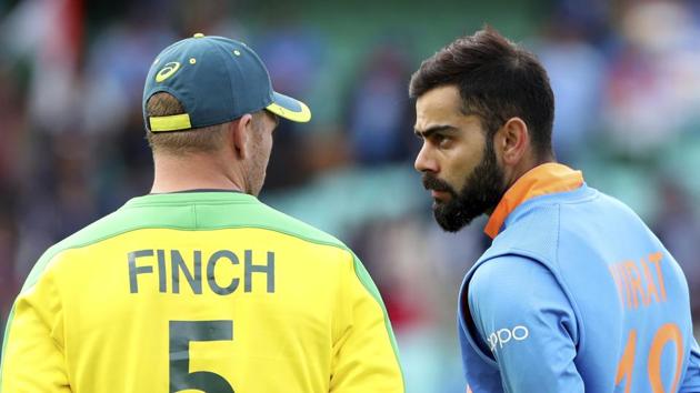 File image: India captain Virat Kohli, right, talks to Australia skipper Aaron Finch. (AP) File image: India captain Virat Kohli, right, talks to Australia skipper Aaron Finch. (AP)