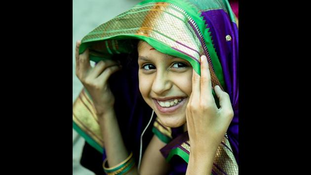 A girl poses for a picture during the celebrations. Savitribai married Jyotirao at the age of nine, and moved to Pune with him. Her husband taught her to read and write. Savitribai took a teachers’ training course and became a qualified teacher in 1847. (Sanket Wankhade / HT Photo) A girl poses for a picture during the celebrations. Savitribai married Jyotirao at the age of nine, and moved to Pune with him. Her husband taught her to read and write. Savitribai took a teachers’ training course and became a qualified teacher in 1847. (Sanket Wankhade / HT Photo)