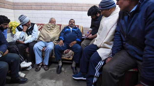 Babu Lal Baliyan and other family members of firefighter Amit Baliyan at their Meet Nagar house in New Delhi. (Raj K Raj / Hindustan Times) Babu Lal Baliyan and other family members of firefighter Amit Baliyan at their Meet Nagar house in New Delhi. (Raj K Raj / Hindustan Times)