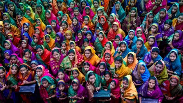 Students of Ahilyadevi High School for Girls pose for a picture while attired like the social reformer Savitribai Phule on the eve of her 189th birth anniversary, at Shaniwar Peth, in Pune, Maharashtra. January 3 marks the birth anniversary of Savitribai Phule, who, along with her husband Jyotirao Phule, worked tirelessly towards creating platforms to educate people from the lower strata of society, in an era when caste-based discrimination was rampant in India. (Sanket Wankhade / HT Photo) Students of Ahilyadevi High School for Girls pose for a picture while attired like the social reformer Savitribai Phule on the eve of her 189th birth anniversary, at Shaniwar Peth, in Pune, Maharashtra. January 3 marks the birth anniversary of Savitribai Phule, who, along with her husband Jyotirao Phule, worked tirelessly towards creating platforms to educate people from the lower strata of society, in an era when caste-based discrimination was rampant in India. (Sanket Wankhade / HT Photo)