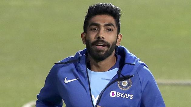 India's Jasprit Bumrah runs to warm up during a training session.(AP)