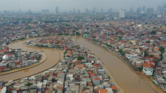 Aerial picture of an area affected by floods, next to Ciliwung river in Jakarta. Around 192,000 have been evacuated to temporary shelters, according to authorities, with many unable to return to their homes in waterlogged neighbourhoods. “We’re encouraging people whose houses are still inundated to go to a safer place,” National Disaster Mitigation Agency spokesman Agus Wibowo told AFP. (Nova Wahyudi / Antara Foto via REUTERS) Aerial picture of an area affected by floods, next to Ciliwung river in Jakarta. Around 192,000 have been evacuated to temporary shelters, according to authorities, with many unable to return to their homes in waterlogged neighbourhoods. “We’re encouraging people whose houses are still inundated to go to a safer place,” National Disaster Mitigation Agency spokesman Agus Wibowo told AFP. (Nova Wahyudi / Antara Foto via REUTERS)