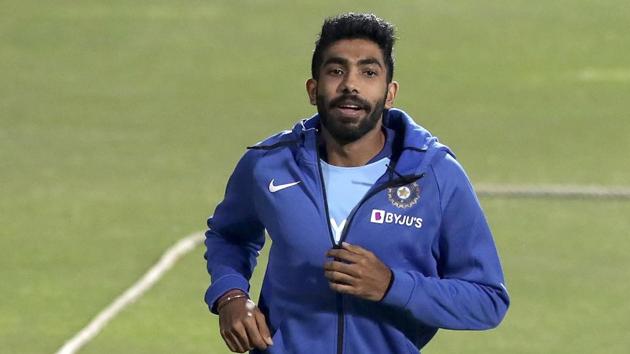 India's Jasprit Bumrah runs to warm up during a training session.(AP)