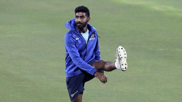 India's Jasprit Bumrah performs stretching exercises during a training session ahead of their first Twenty20 cricket match against Sri Lanka in Gauhati, India, Friday, Jan. 3, 2020. (AP) India's Jasprit Bumrah performs stretching exercises during a training session ahead of their first Twenty20 cricket match against Sri Lanka in Gauhati, India, Friday, Jan. 3, 2020. (AP)