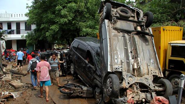 Waters have receded in many areas and power is being restored after being cut off in many districts. In hard-hit Bekasi, on the outskirts of Jakarta, swampy streets were littered with debris and crushed cars lying on top of each other -- with waterline marks reaching as high as the second floors of buildings. (Risky Andrianto / Antara Foto via REUTERS) Waters have receded in many areas and power is being restored after being cut off in many districts. In hard-hit Bekasi, on the outskirts of Jakarta, swampy streets were littered with debris and crushed cars lying on top of each other -- with waterline marks reaching as high as the second floors of buildings. (Risky Andrianto / Antara Foto via REUTERS)