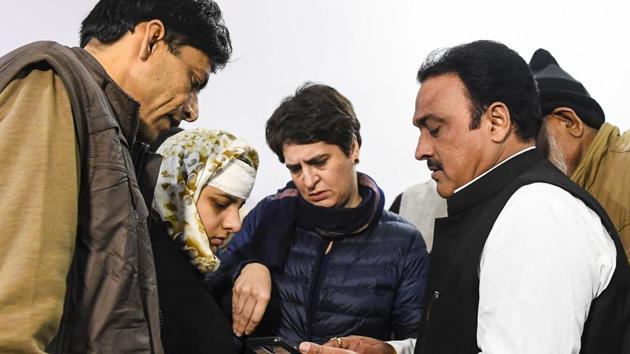 Muzaffarnagar: Congress General Secretary Priyanka Gandhi Vadra interacts with Ruqaiya Parveen, whose house was allegedly ransacked by the police during the violence that broke out after anti-CAA protests, in?Muzaffarnagar, Uttar Pradesh.(PTI)