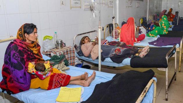 Kota: Sick children in the laps of their mothers take treatments at the JK Lon hospital. (PTI) Kota: Sick children in the laps of their mothers take treatments at the JK Lon hospital. (PTI)