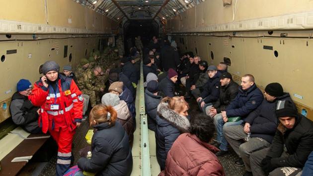 Ukrainian citizens, who were exchanged during a prisoners of war (POWs) swap between Ukraine and the separatist self-proclaimed republics, are seen inside an aircraft at Chuhuiv airport near Kharkiv, Ukraine. (Ukrainian Presidential Press Service via REUTERS) Ukrainian citizens, who were exchanged during a prisoners of war (POWs) swap between Ukraine and the separatist self-proclaimed republics, are seen inside an aircraft at Chuhuiv airport near Kharkiv, Ukraine. (Ukrainian Presidential Press Service via REUTERS)