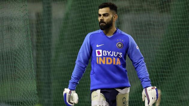 India's captain Virat Kohli walks to bat in the nets during a training session.(AP)