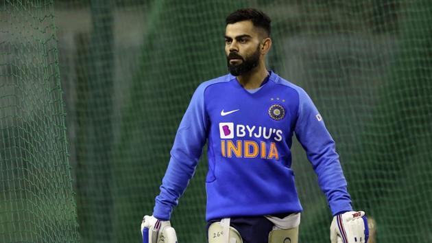 India's captain Virat Kohli walks to bat in the nets.(AP)