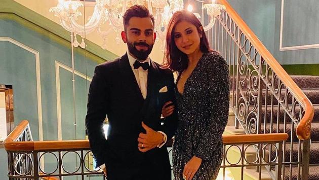 Anushka Sharma looked gorgeous in an overlap beaded interstellar gown by Rohit Gandhi and Rahul Khanna, and she looked absolutely stunning in the sequinned grey number. Her short hair was neat as always and sported heavy eye make-up along with strappy heels. Virat also went for a tuxedo and was looking perfect standing next to Anushka. (INSTAGRAM) Anushka Sharma looked gorgeous in an overlap beaded interstellar gown by Rohit Gandhi and Rahul Khanna, and she looked absolutely stunning in the sequinned grey number. Her short hair was neat as always and sported heavy eye make-up along with strappy heels. Virat also went for a tuxedo and was looking perfect standing next to Anushka. (INSTAGRAM)