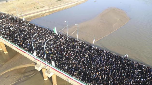 Mourners attend a funeral ceremony for Gen. Qassem Soleimani, who was killed in Iraq in a U.S. drone strike, in the southwestern city of Ahvaz, Iran, Sunday, Jan. 5, 2020. The body of Soleimani arrived Sunday in Iran to throngs of mourners, as U.S. President Donald Trump threatened to bomb 52 sites in the Islamic Republic if Tehran retaliates by attacking Americans. (AP) Mourners attend a funeral ceremony for Gen. Qassem Soleimani, who was killed in Iraq in a U.S. drone strike, in the southwestern city of Ahvaz, Iran, Sunday, Jan. 5, 2020. The body of Soleimani arrived Sunday in Iran to throngs of mourners, as U.S. President Donald Trump threatened to bomb 52 sites in the Islamic Republic if Tehran retaliates by attacking Americans. (AP)