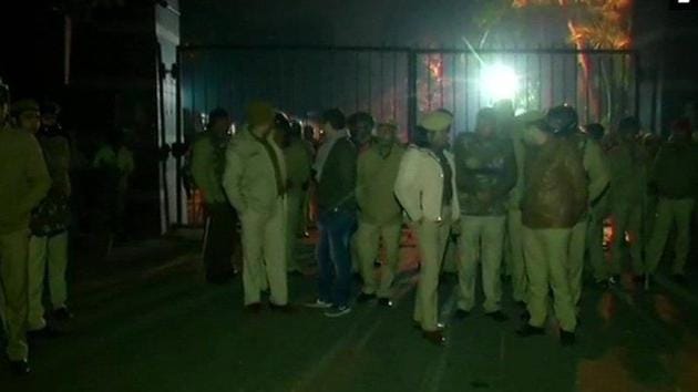 Delhi Police personnel stand guard outside Jawaharlal Nehru University. (ANI PHOTO.) Delhi Police personnel stand guard outside Jawaharlal Nehru University. (ANI PHOTO.)