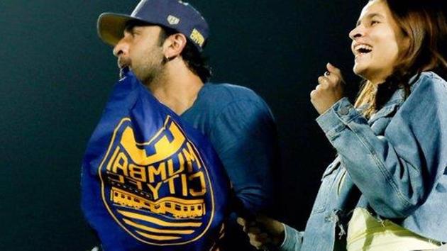 Alia Bhatt joins Ranbir Kapoor as they watch a football game in Mumbai.