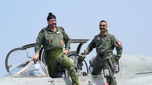 Air Chief Marshal BS Dhanoa and Wing Commander Abhinandan Varthaman, the IAF pilot who became the face of a tense military confrontation between India and Pakistan in February, pose for a photograph after a sortie on the MiG 21 jet, at Airforce Station.(PTI) Air Chief Marshal BS Dhanoa and Wing Commander Abhinandan Varthaman, the IAF pilot who became the face of a tense military confrontation between India and Pakistan in February, pose for a photograph after a sortie on the MiG 21 jet, at Airforce Station.(PTI)