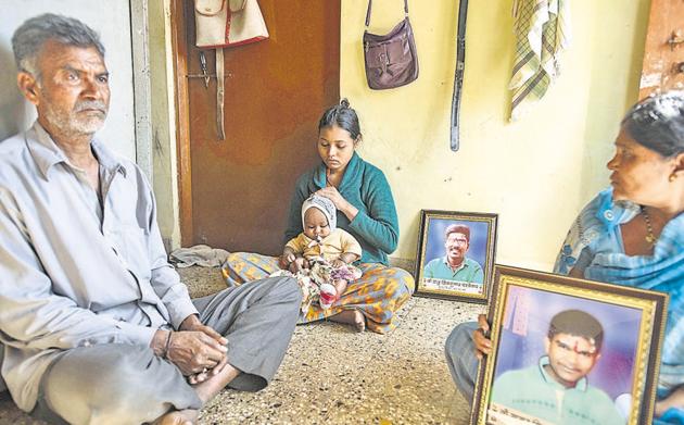 Sangeeta Karandekar (C), wife of victim Raju, with their six-month-old son. Shivkumar (L) and Sushirabai, parents of Raju and Sagar, at their residence in Bijleenagar, Chinchwad. (Pratham Gokhale/HT Photo) Sangeeta Karandekar (C), wife of victim Raju, with their six-month-old son. Shivkumar (L) and Sushirabai, parents of Raju and Sagar, at their residence in Bijleenagar, Chinchwad. (Pratham Gokhale/HT Photo)