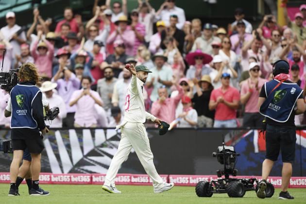 Australia's Nathan Lyon leaves the field after taking 5 wickets on day three of the third cricket test match between Australia and New Zealand at the Sydney Cricket Ground in Sydney Sunday, Jan. 5, 2020. (Andrew Cornaga/Photosport via AP)(AP)