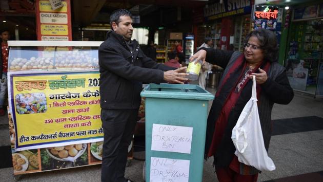 A woman throws a plastic bottle in a bin designated for plastic waste, at Sector 23, Dwarka, in New Delhi,. (Vipin Kumar /HT PHOTO) A woman throws a plastic bottle in a bin designated for plastic waste, at Sector 23, Dwarka, in New Delhi,. (Vipin Kumar /HT PHOTO)