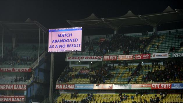 Indian spectators leave standing stadium after the match declared abandoned. (AP) Indian spectators leave standing stadium after the match declared abandoned. (AP)