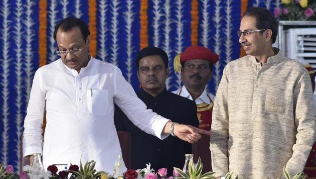 AJit Pawar and Uddhav Thackeray during the swearing in ceremony for Maharashtra cabinet expansion at Vidhan Bhavan in Mumbai, India, on Monday, December 30, 2019.(Anshuman Poyrekar/HT Photo)