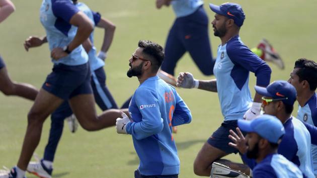 India's captain Virat Kohli, center, runs with teammates to warm up during a training session ahead of their first Twenty20 cricket match against Sri Lanka in Gauhati, India, Saturday, Jan. 4, 2020.(AP)