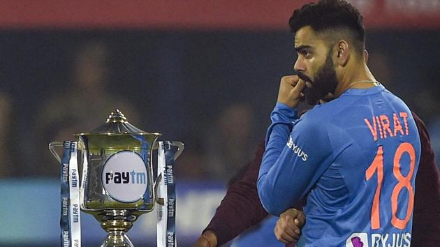 Indian skipper Virat Kohli looks on at the trophy. (PTI) Indian skipper Virat Kohli looks on at the trophy. (PTI)