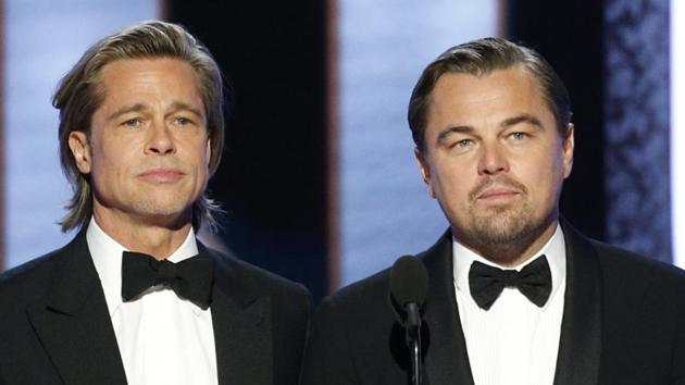 This image released by NBC shows presenters Brad Pitt, left, and Leonardo DiCaprio at the 77th Annual Golden Globe Awards.(AP)