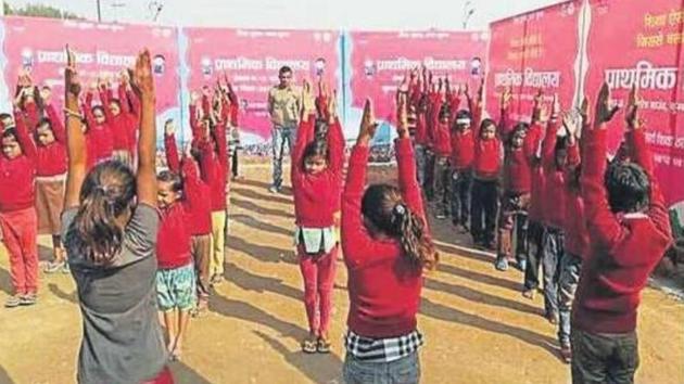 Kids at a makeshift school in tent city during Kumbh-2019. (HT File Photo) Kids at a makeshift school in tent city during Kumbh-2019. (HT File Photo)