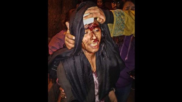 Students’ union president Aishe Ghosh was also seen with head wounds in the initial videos that emerged. By around 8pm, at least 23 people, including Ghosh and a JNU professor, arrived at AIIMS Trauma Centre from JNU after a demonstration against hikes in hostel and academic fees. (PTI) Students’ union president Aishe Ghosh was also seen with head wounds in the initial videos that emerged. By around 8pm, at least 23 people, including Ghosh and a JNU professor, arrived at AIIMS Trauma Centre from JNU after a demonstration against hikes in hostel and academic fees. (PTI)