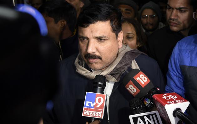 AAP leader Sanjay Singh talks to media as he arrives at AIIMS Trauma Centre where students from JNU have been admitted following violence at the university.(ANI Photo)