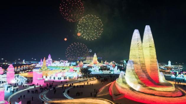 Tourists watch a fireworks display during the China Harbin International Ice and Snow Festival in Harbin. (Noel Celis/AFP) Tourists watch a fireworks display during the China Harbin International Ice and Snow Festival in Harbin. (Noel Celis/AFP)