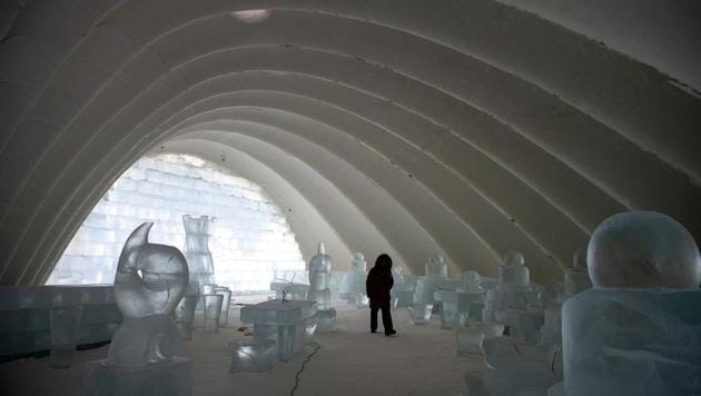 A worker walks inside an ice sculpture at the Harbin Ice and Snow World festival in Harbin. The Harbin festival, featuring glittering palaces and fantastical scenes sculpted out of ice, has drawn millions of people over the years to one of China’s coldest cities. (Noel Celis/AFP) A worker walks inside an ice sculpture at the Harbin Ice and Snow World festival in Harbin. The Harbin festival, featuring glittering palaces and fantastical scenes sculpted out of ice, has drawn millions of people over the years to one of China’s coldest cities. (Noel Celis/AFP)