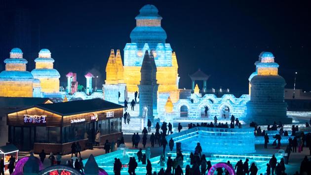 An aerial view shows ice sculptures illuminated at the Harbin Ice and Snow World festival in Harbin. This year’s festivities will coincide with the city’s first skiing marathon this week, according to the official Xinhua news agency. (Noel Celis/AFP) An aerial view shows ice sculptures illuminated at the Harbin Ice and Snow World festival in Harbin. This year’s festivities will coincide with the city’s first skiing marathon this week, according to the official Xinhua news agency. (Noel Celis/AFP)