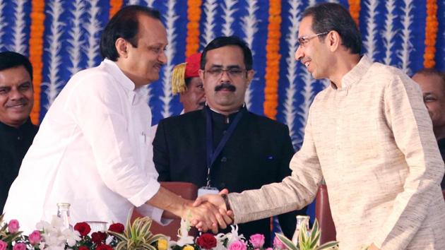 Maharashtra Chief Minister Uddhav Thackeray shakes hand with NCP leader Ajit Pawar as he took oath as Deputy Chief Minister of Maharashtra during the swearing-in ceremony at Vidhan Bhavan in Mumbai on Monday.(ANI file photo) Maharashtra Chief Minister Uddhav Thackeray shakes hand with NCP leader Ajit Pawar as he took oath as Deputy Chief Minister of Maharashtra during the swearing-in ceremony at Vidhan Bhavan in Mumbai on Monday.(ANI file photo)