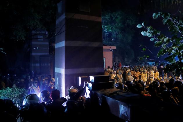 Police at the Jawaharlal Nehru University (JNU) after violence at the campus in New Delhi on Sunday(Reuters Photo)