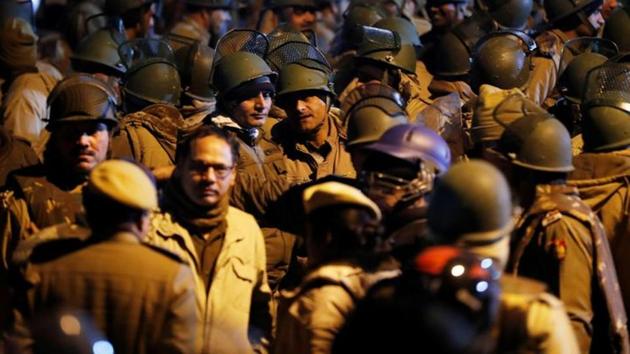 Police at the Jawaharlal Nehru University (JNU) after violence at the campus in New Delhi on Sunday.(Reuters File Photo)