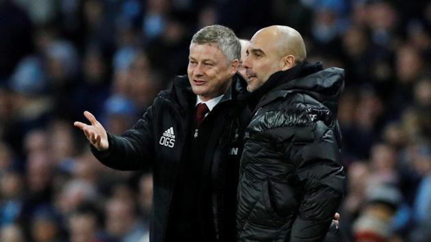 Manchester City manager Pep Guardiola and Manchester United manager Ole Gunnar Solskjaer. (REUTERS) Manchester City manager Pep Guardiola and Manchester United manager Ole Gunnar Solskjaer. (REUTERS)