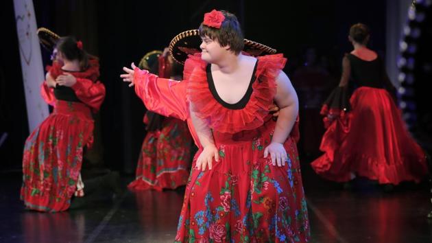 Children with Down syndrome perform in a dance show. Most of the older facilities were outside cities and sometimes housed more than 350 people, with children and adults often together. UNICEF has said these institutions did not offer minimally decent living standards. (Vadim Ghirda/AP) Children with Down syndrome perform in a dance show. Most of the older facilities were outside cities and sometimes housed more than 350 people, with children and adults often together. UNICEF has said these institutions did not offer minimally decent living standards. (Vadim Ghirda/AP)