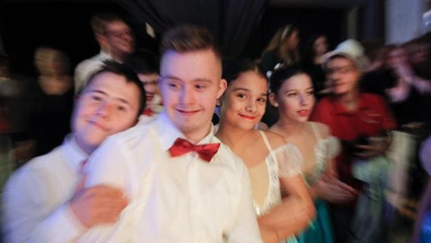 Boys with Down syndrome pose next to ballerinas of the Arabesque Children’s Ballet Ensemble. “People with Down offer everyone sincere and unconditional love,” Bucur said. “Living alongside them makes one overcome the focus on materialism, enjoy the small things in life and care for one another.” (Vadim Ghirda/AP) Boys with Down syndrome pose next to ballerinas of the Arabesque Children’s Ballet Ensemble. “People with Down offer everyone sincere and unconditional love,” Bucur said. “Living alongside them makes one overcome the focus on materialism, enjoy the small things in life and care for one another.” (Vadim Ghirda/AP)
