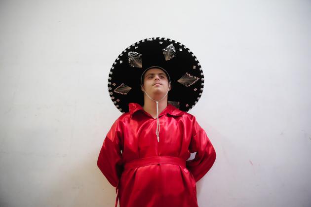 A boy with Down syndrome leans against a wall before performing in a dance show in Bucharest, Romania. During Romania’s communist era, children with disabilities were shunned, often kept in institutions or at home, deprived of schooling and social interactions. Recent art shows in which children with Down syndrome had starring roles illustrate social change since communism fell in 1989. (Vadim Ghirda/AP) A boy with Down syndrome leans against a wall before performing in a dance show in Bucharest, Romania. During Romania’s communist era, children with disabilities were shunned, often kept in institutions or at home, deprived of schooling and social interactions. Recent art shows in which children with Down syndrome had starring roles illustrate social change since communism fell in 1989. (Vadim Ghirda/AP)