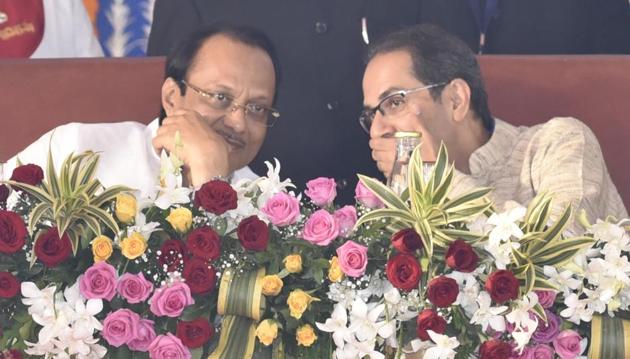 Ajit Pawar and Uddhav Thackeray during the swearing in ceremony for Maharashtra cabinet expansion at Vidhan Bhavan in Mumbai, India, on Monday, December 30, 2019.(Anshuman Poyrekar/HT Photo)
